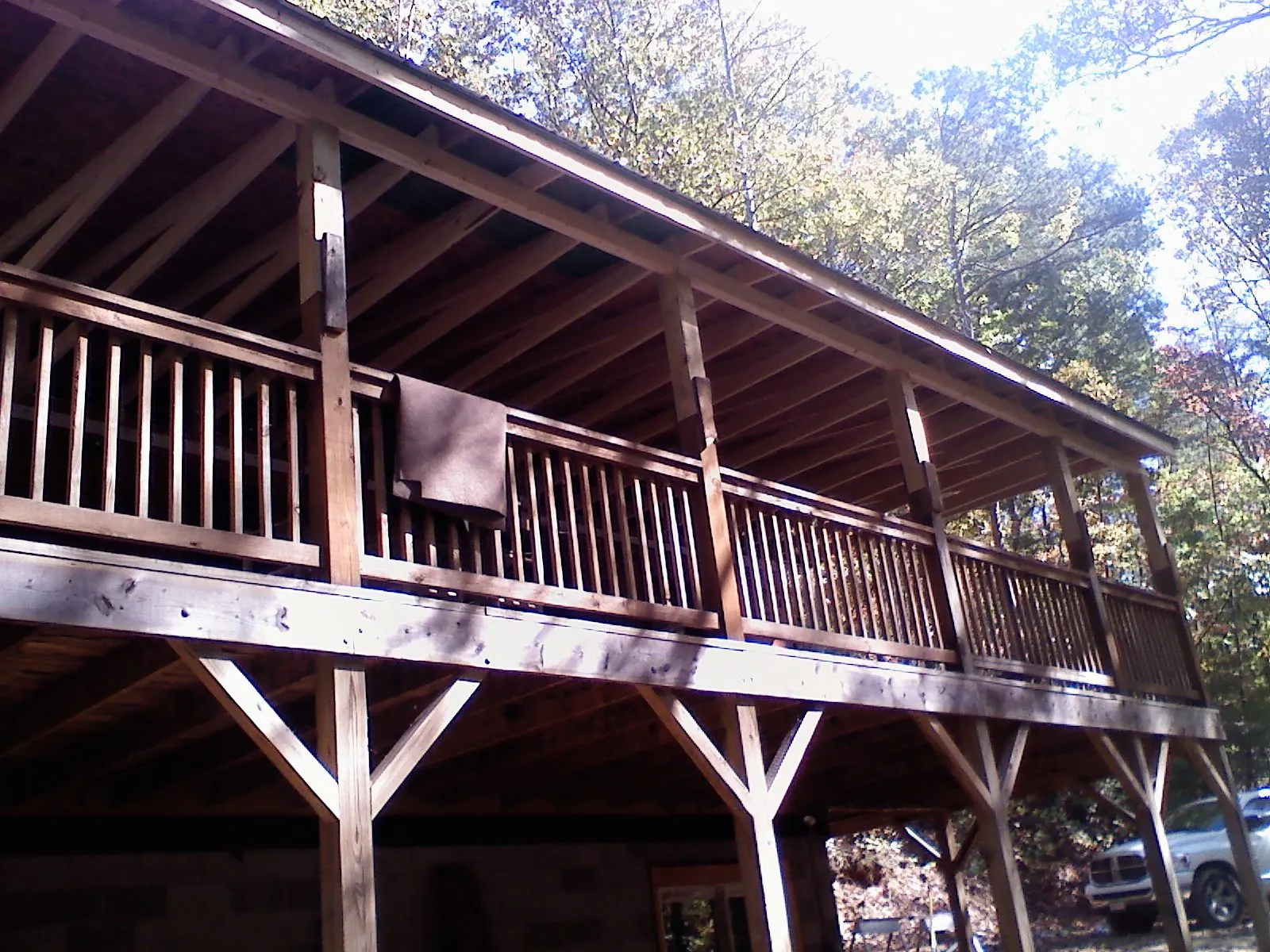 Timber framing under a new elevated porch and deck — Roof Leak Repair in Hill City by Roofing Brothers